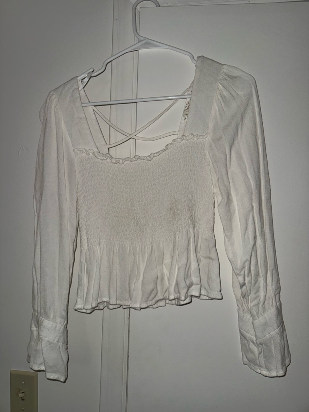 Love Riche Ivory Smocked Peplum Blouse with Crisscross Back